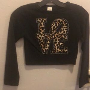 Girls cheetah print shirt.